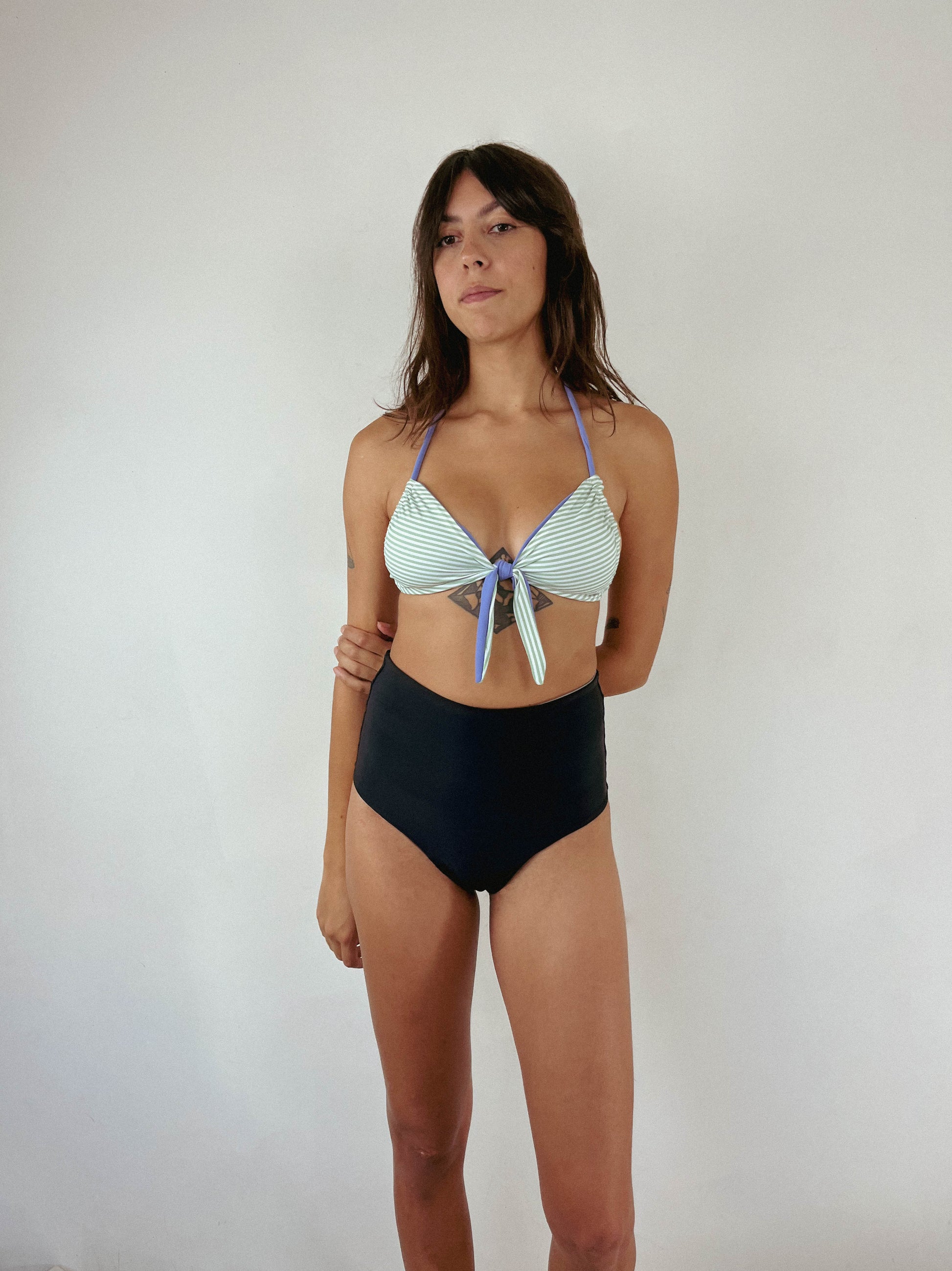 Custom reversible swim top in the lola style in periwinkle and green stripe