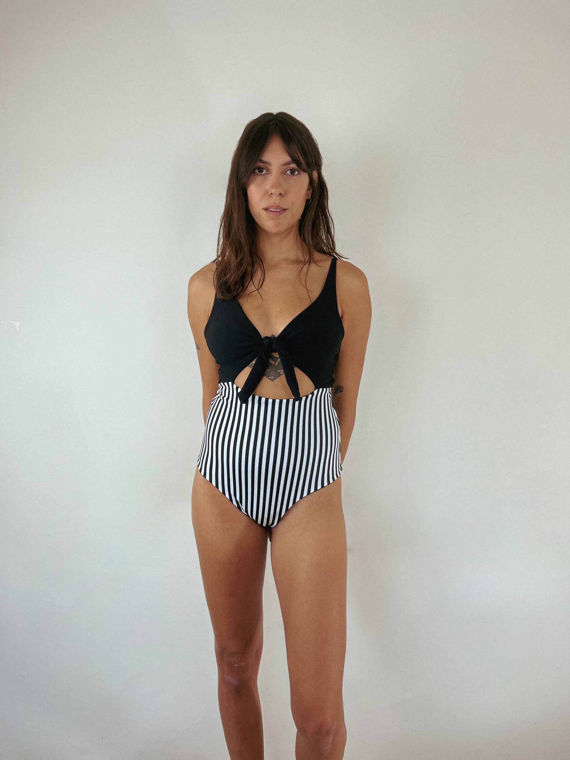 Cute one piece swimsuit in black and stripes