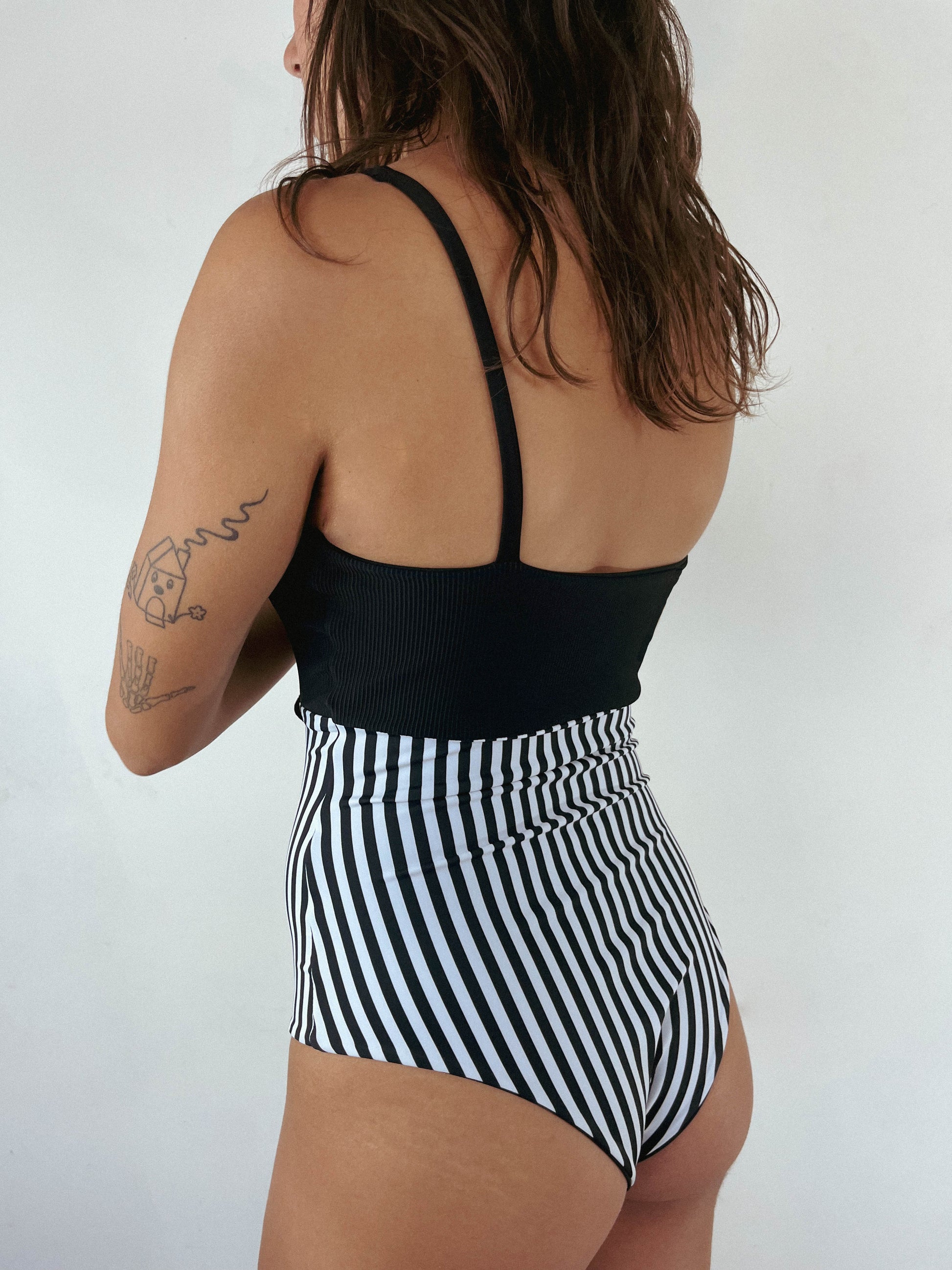 Cute one piece swimsuit in black and stripes