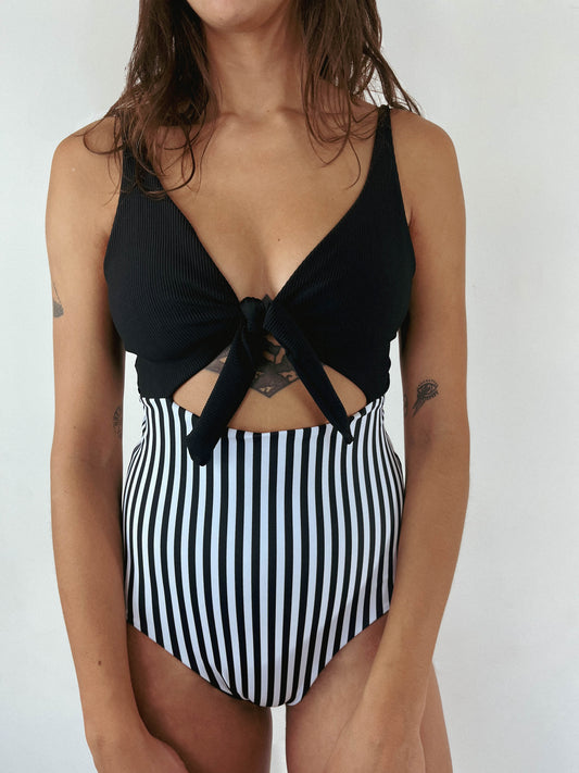 Cute one piece swimsuit in black and stripes