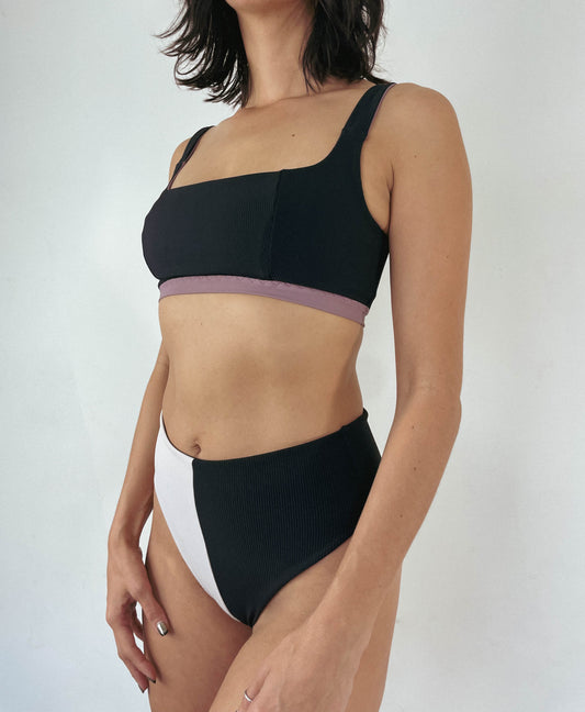 Reversible high waisted swimwear bottoms in black and white color block