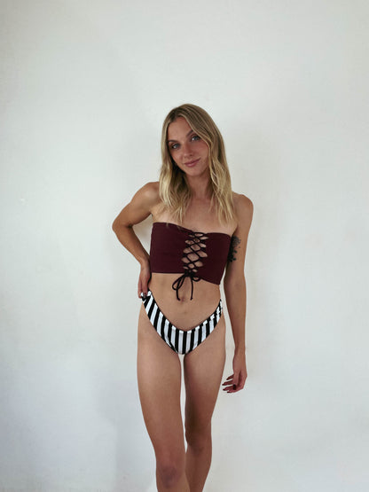 custom reversible swim bottoms on a model in jett style