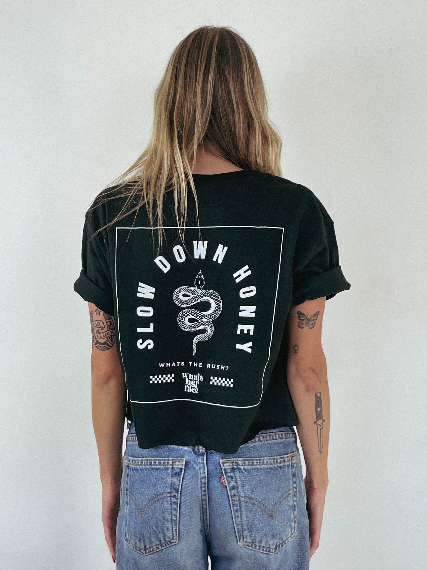 back of Slow Down Honey graphic tee with snake